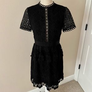 Like new, black lace, short sleeve dress.